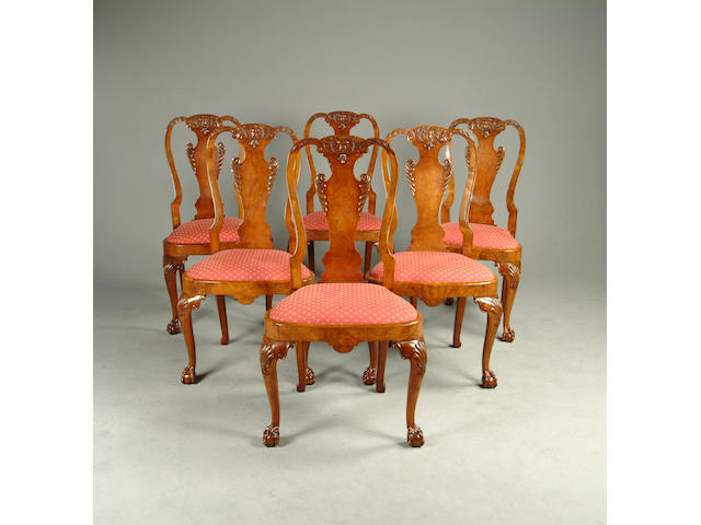 A set of six Queen Anne style walnut dining chairs