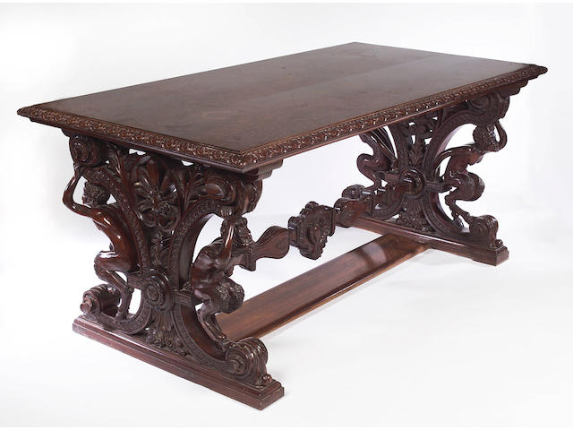 A late 19th/early 20th Century Continental carved walnut Centre Table,