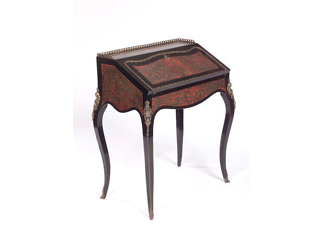 A late 19th Century French ebony, stained tortoiseshell and brass marquetry Bureau de Dame,Louis XV style, in the manner of Boulle
