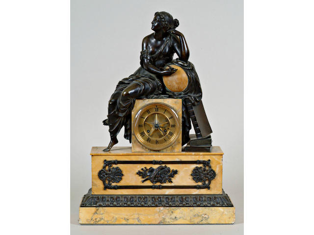 A 19th Century French bronze and siena marble mantel clock