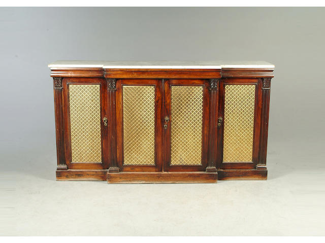 An early Victorian rosewood breakfront side cabinet