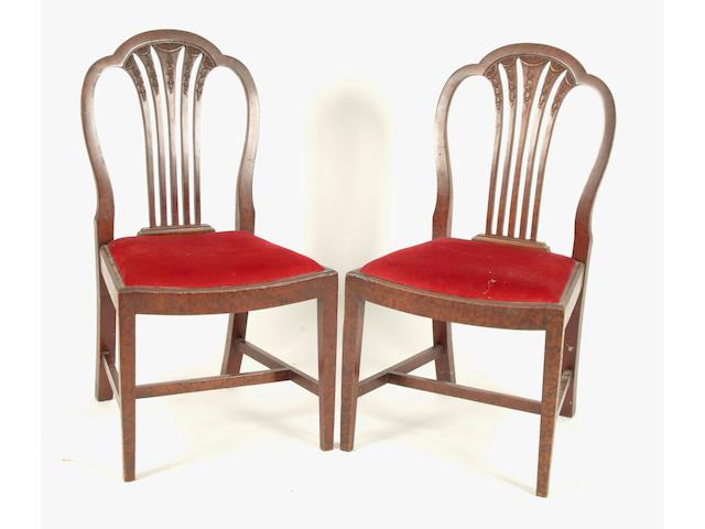 A set of six early 19th century mahogany and faux walnut dining chairs