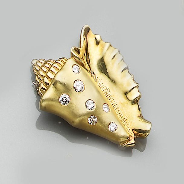 A diamond-set shell brooch