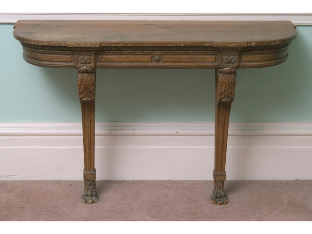 An early 19th Century stripped pine, beech and oak console table