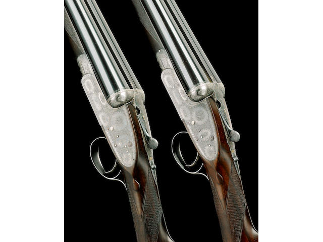A FINE PAIR OF 12-BORE SINGLE-TRIGGER ASSISTED-OPENING SIDELOCK EJECTOR GUNS BY BOSS, NO. 7869/70 In