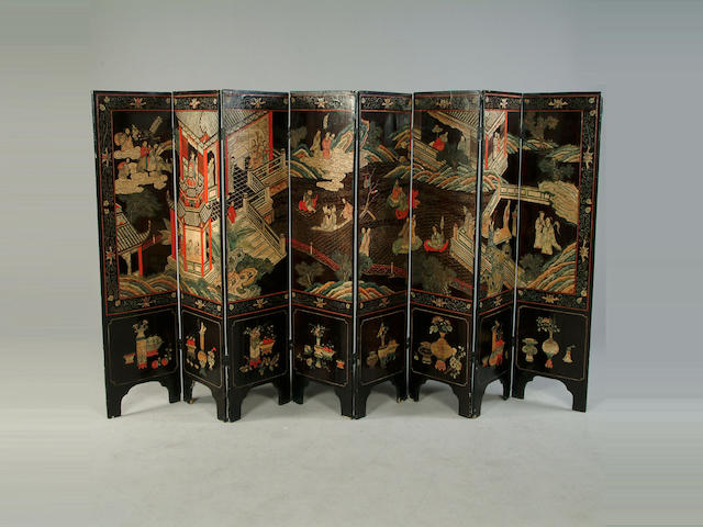 A 19th century Chinese export coromandle lacquer eight fold screen