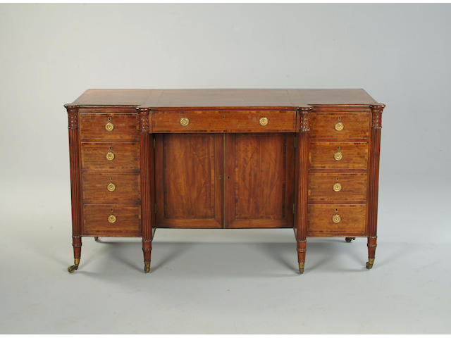 A Regency mahogany and crossbanded kneehole dressing table