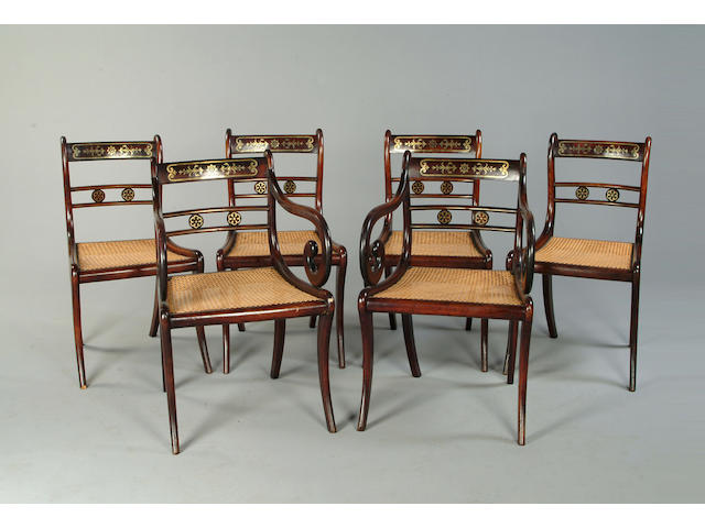 A set of six Regency rosewood grained and brass inlaid chairs