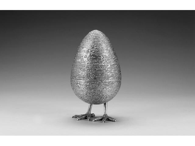 STUART DEVLIN : A large silver-gilt novelty jewellery casket, modelled as an egg, London 1971,