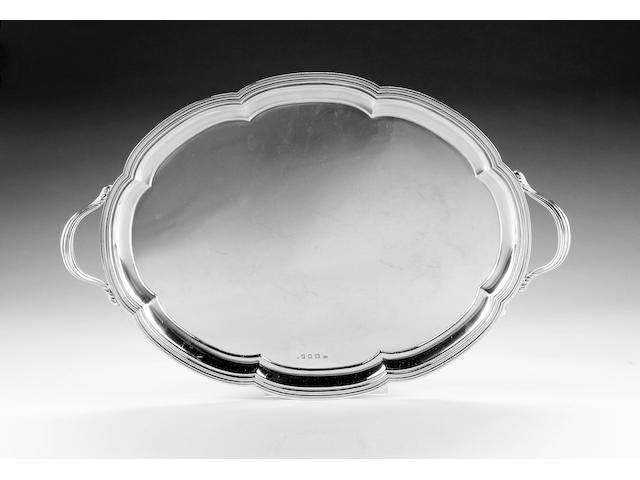 A silver shaped-oval two-handled tray, by Goldsmiths & Silversmiths Co. Ltd., London 1911,