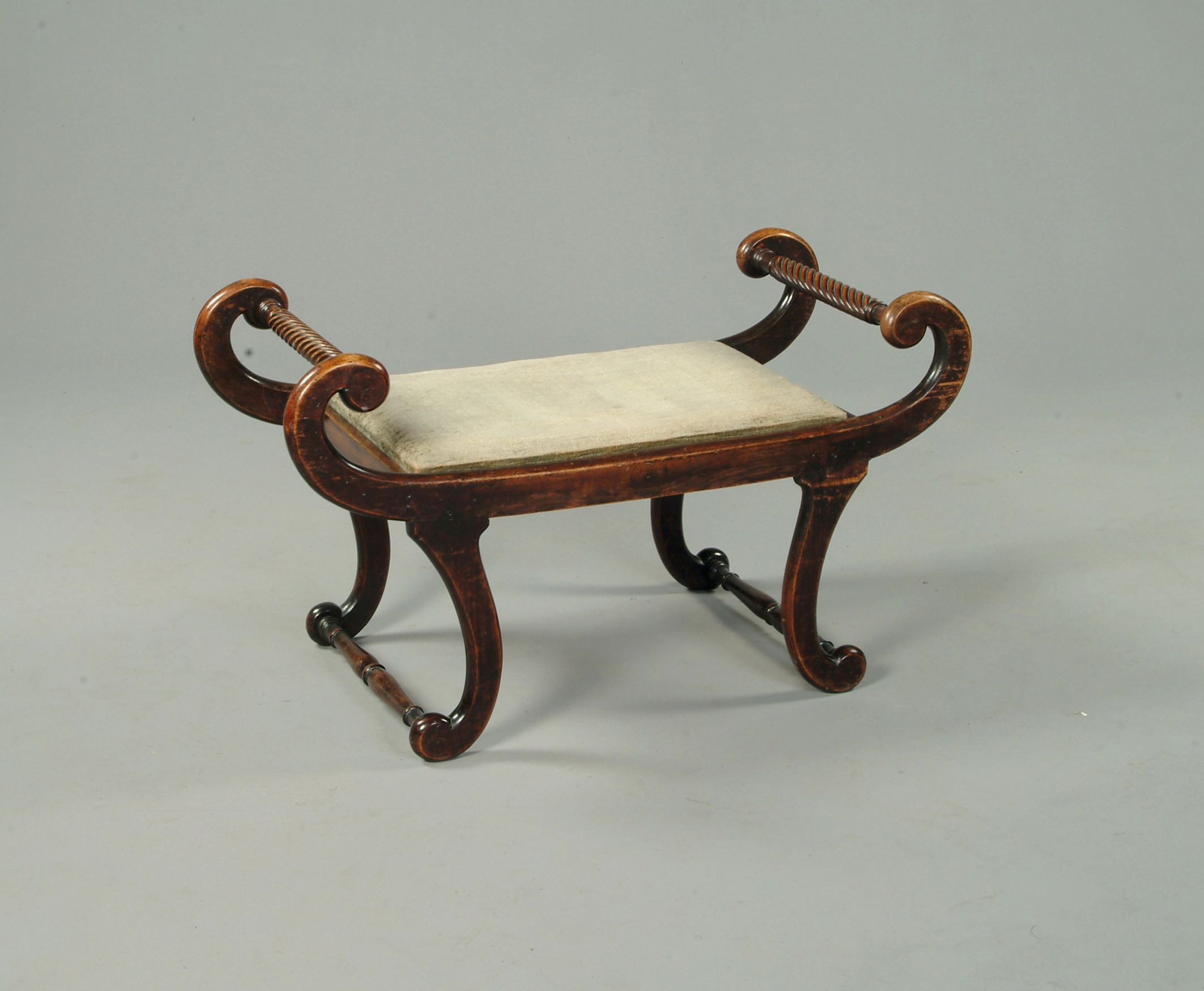 A Regency beech window seat
