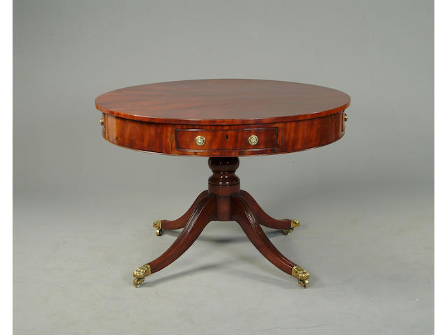 A Regency mahogany drum top circular table