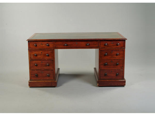 A late Victorian mahogany pedestal desk