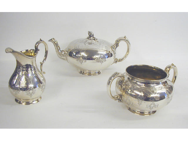 A Victorian three-piece tea set, by Robert Harper, 1872-73,