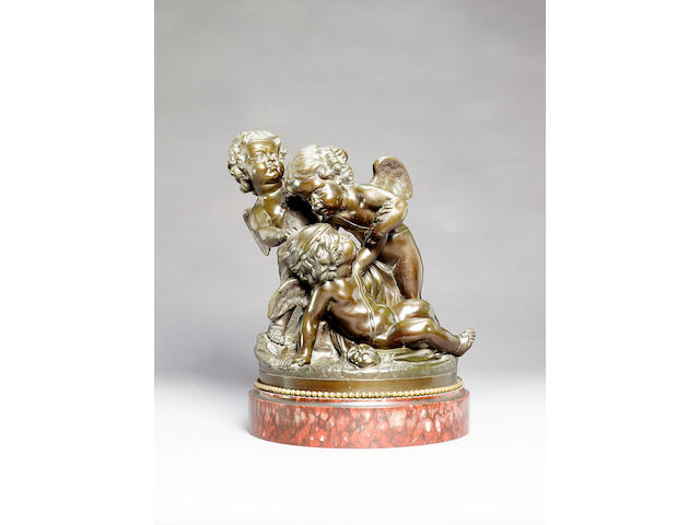Manner of Jean Michel Clodion (French, 1738-1814): A bronze figural group of three winged putti
