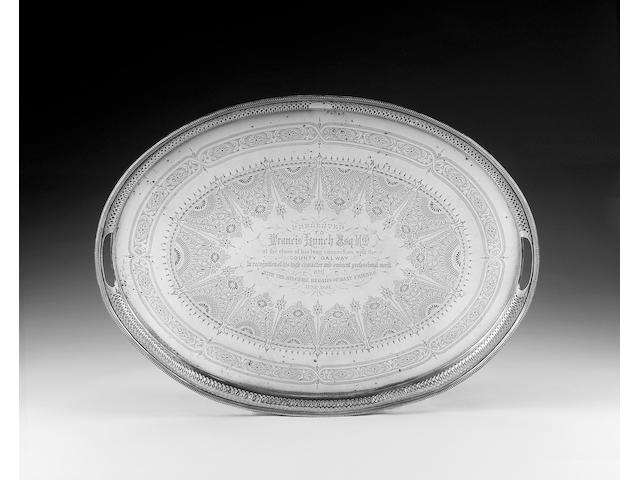 A late Victorian silver oval gallery tray with inset handles, by Martin & Hall, Sheffield 1880,