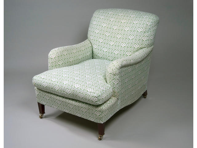 A pair of Howard & Sons upholstered arm chairs,