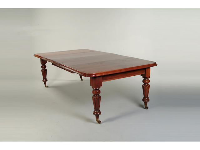 A Victorian mahogany extending dining table
