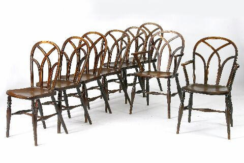 A harlequin set of eight 19th Century Windsor chairs,