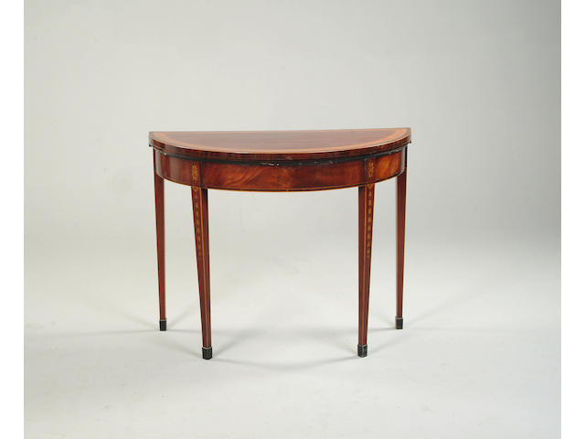 A George III mahogany, satinwood banded and marquetry inlaid card table