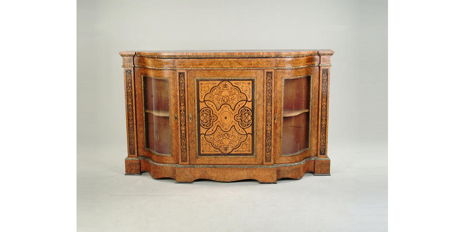 A Victorian walnut, tulipwood crossbanded, ebonised and marquetry credenza