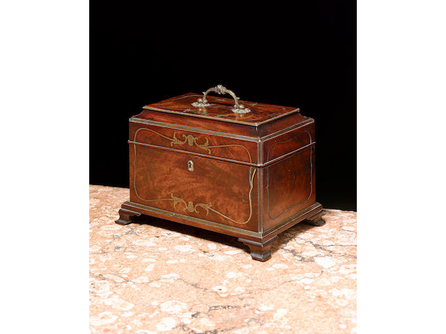 A George II mahogany and brass inlaid Tea Caddy in the manner of John Channon,