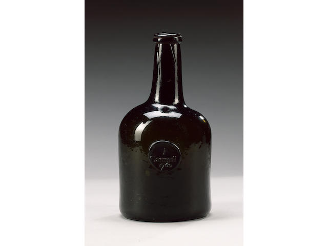 A dated and sealed wine bottle, dated 1764,