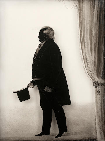 John Woodhouse, A silhouette of Colonel Reid, full-length, profile to the left, wearing tail-coat and gloves, he holds a top hat in his right hand, tied curtain to the right