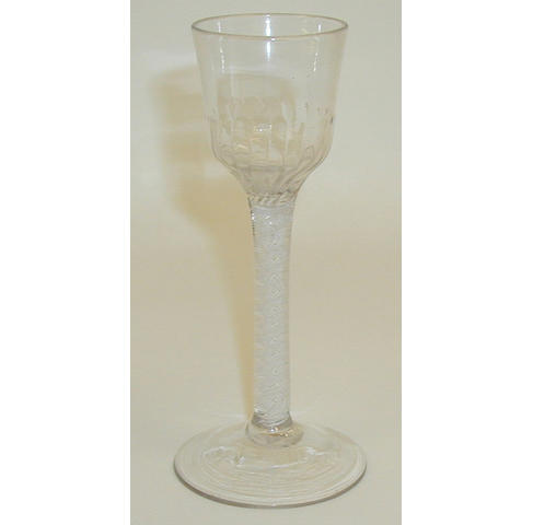 An opaque twist wine or cordial glass,