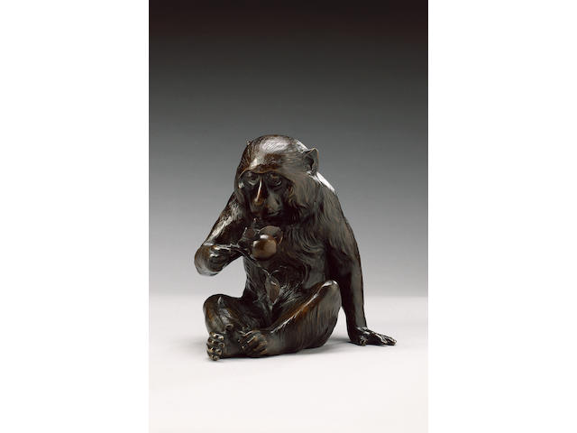 A bronze figure of a seated Japanese Macacque Monkey