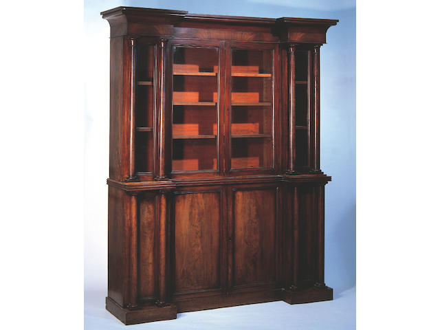 An early Victorian mahogany inverted breakfront bookcase,