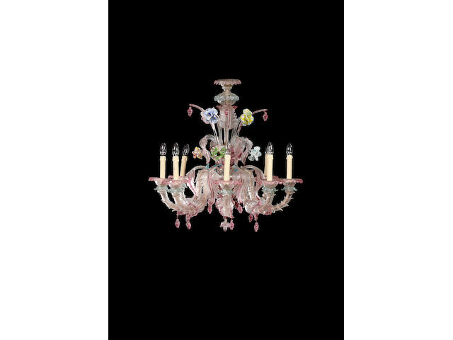 An early 20th century Venetian pink, clear and pastel polychrome glass eight light chandelier