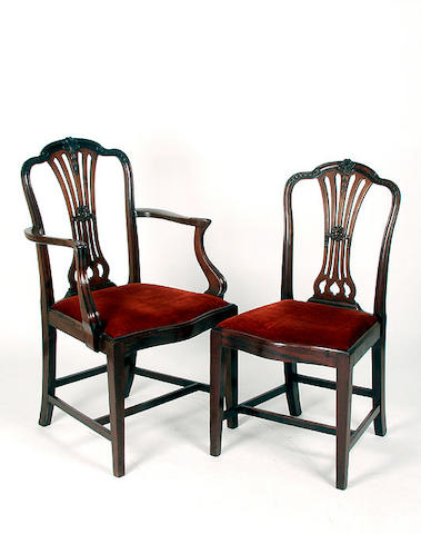 A set of eight Hepplewhite style mahogany dining chairs