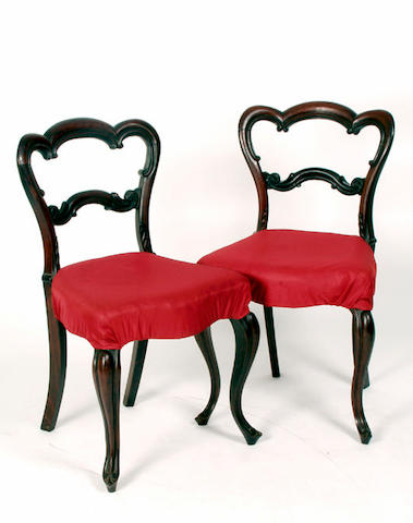 A set of four mid Victorian rosewood dining chairs