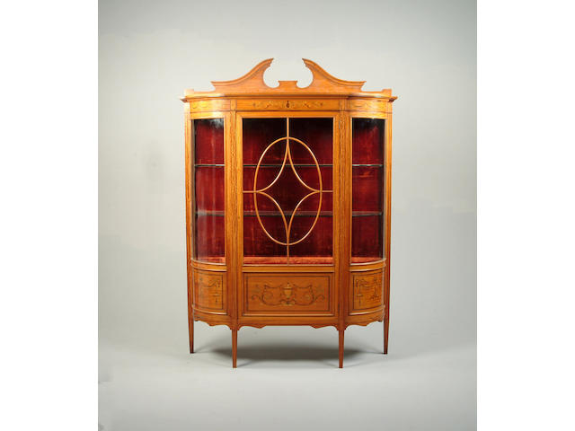 An Edwardian satinwood and marquetry display cabinet