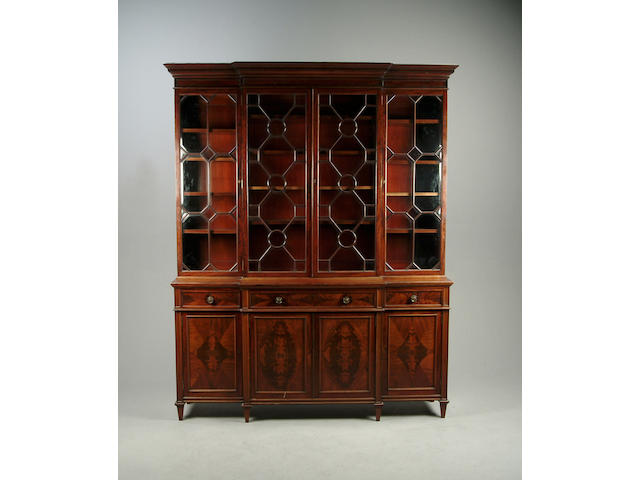 A George III style mahogany breakfront bookcase