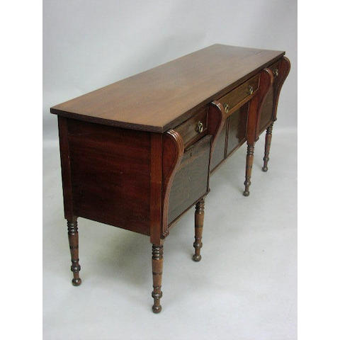 An early 19th Century mahogany sideboard,