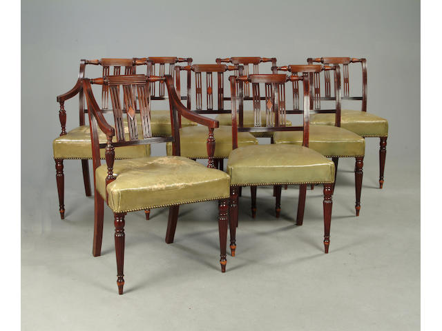A set of eight late George III style mahogany dining chairs