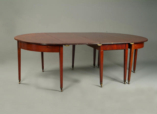 An early 19th century mahogany dining table