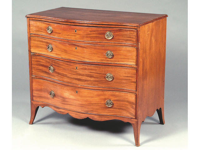 A George III mahogany serpentine chest,