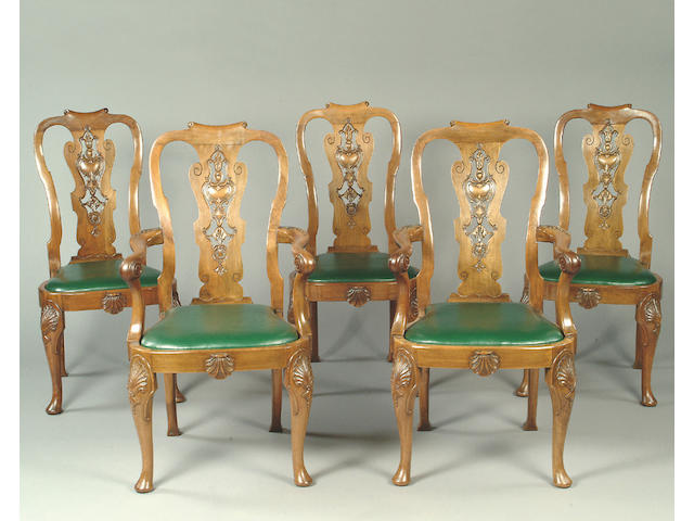 A set of twelve Queen Anne style walnut dining chairs,