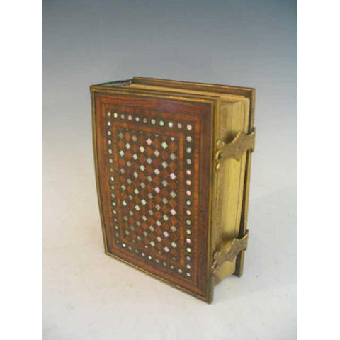 A parquetry and mother of pearl inlaid Photograph Album containing a collection of 19th Century Photographs,