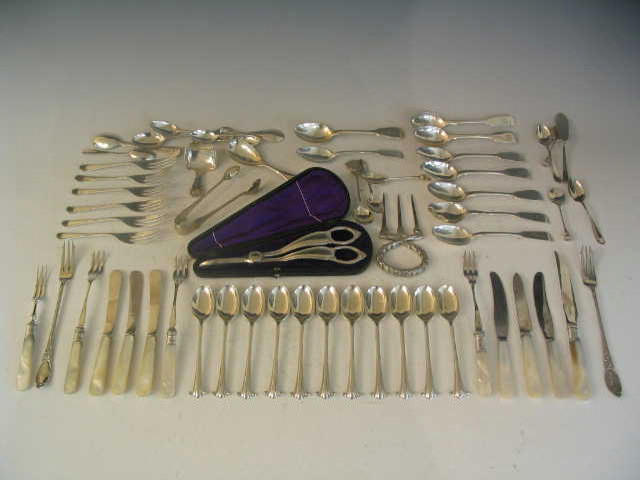 A quantity of silver Flatware to include a set of ten Teaspoons and Sugar Tongs by Walker & Hall Sheffield (qty),