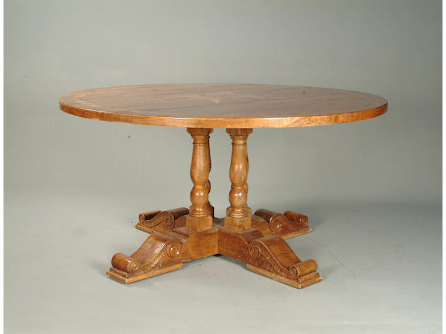 A large 20th Century oak and inlaid centre table,