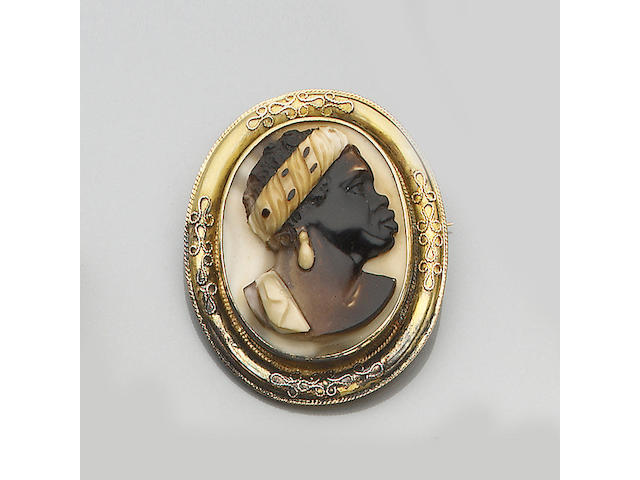 A mid 19th century operculum shell cameo brooch
