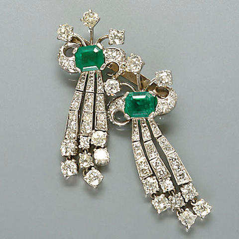An emerald and diamond brooch