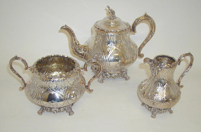 A Victorian three piece tea set, maker's mark "JFF & FF", Sheffield, 1874,
