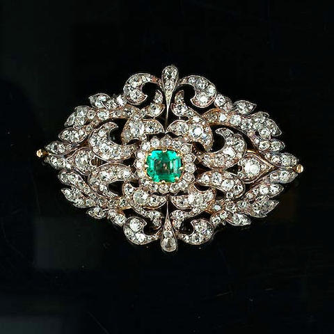 A mid Victorian emerald and diamond brooch/necklace centre