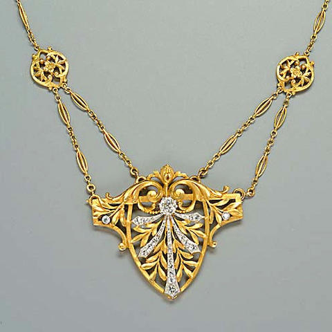 A late 19th century gold and diamond pendant/necklace