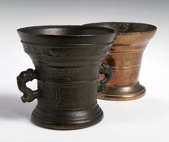 A 17th Century Continental bronze twin handled Mortar and a 19th Century brass Mortar,